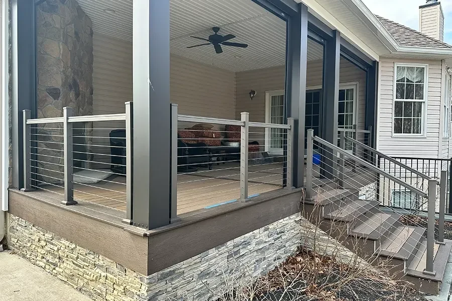 Covered deck with railings and steps